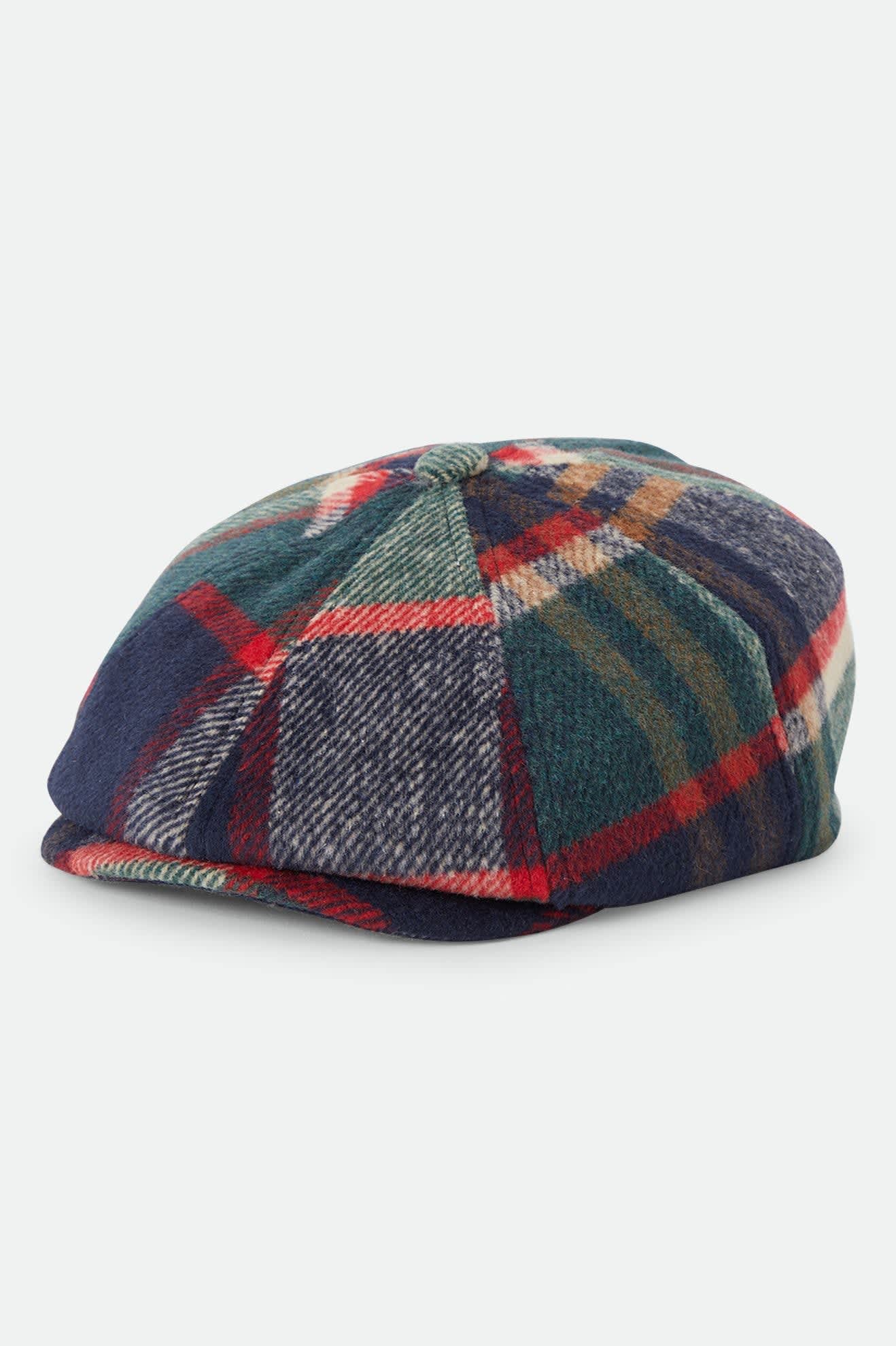 Unisex Brood Newsboy Cap in the color Navy/Green/Red/Cream - Front Product Laydown Image