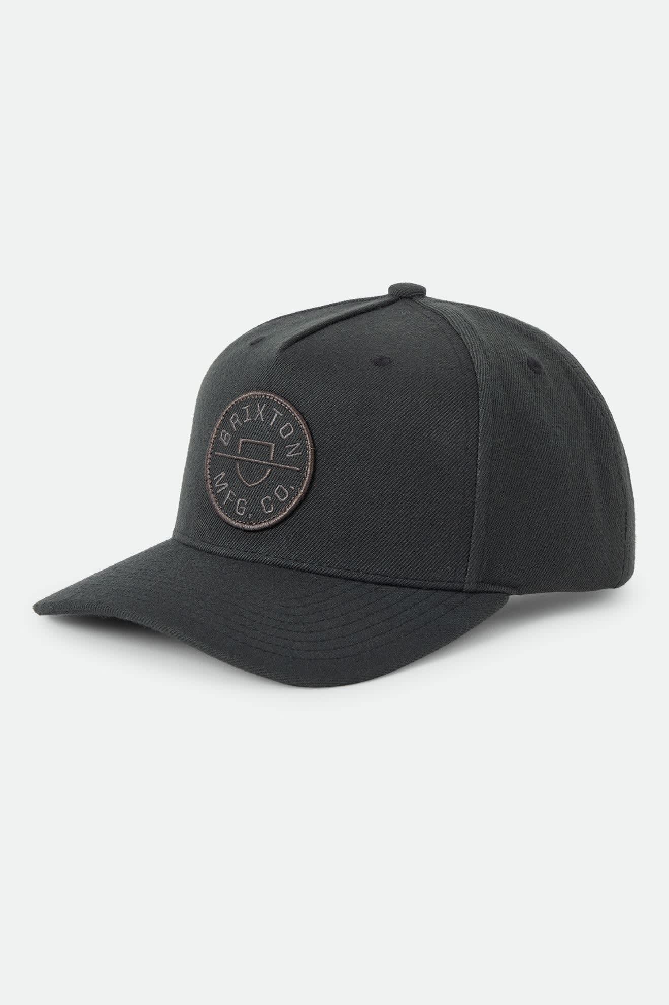 Unisex Crest Snapback in the color Black/Black - Front Product Laydown Image
