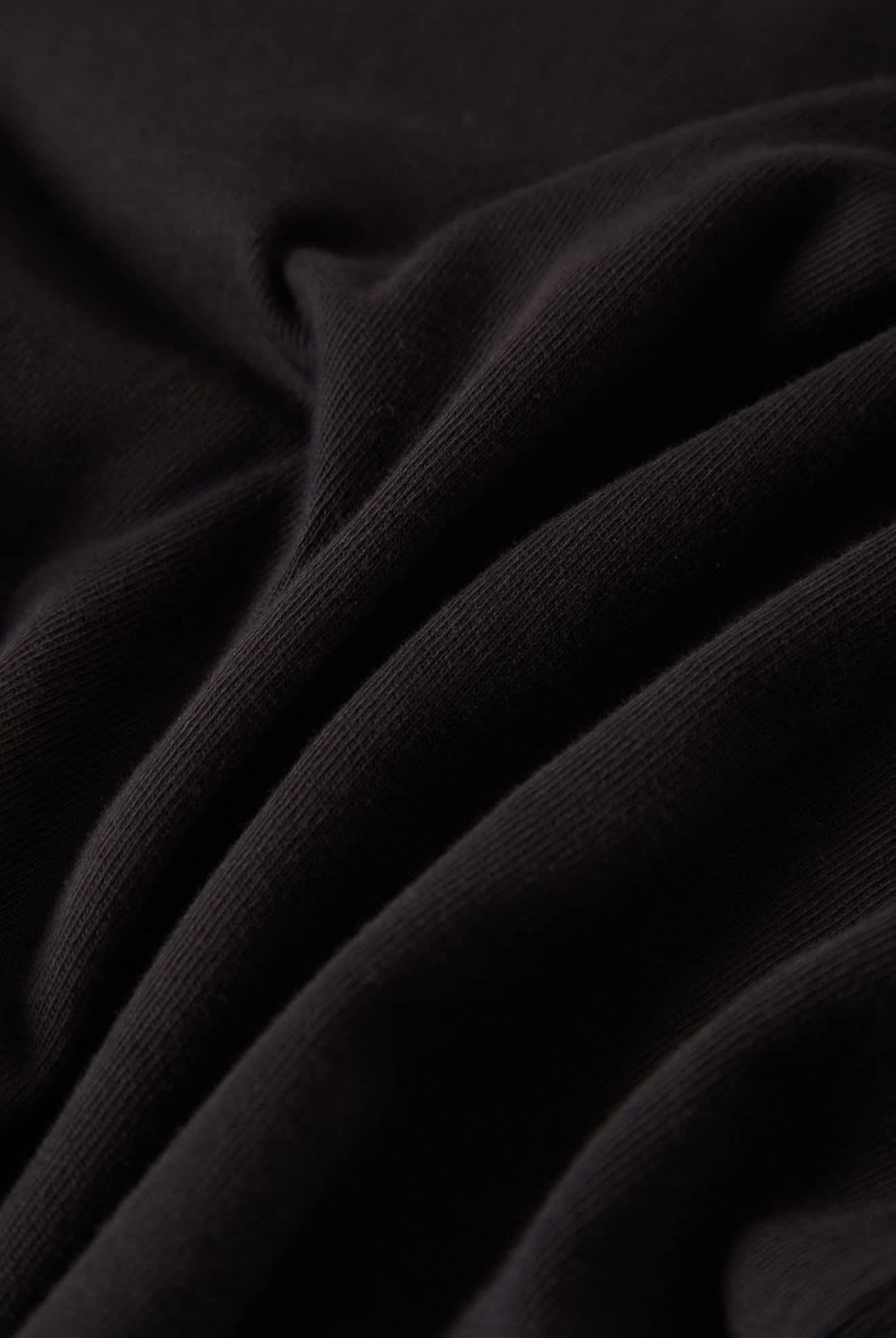 Women's Carefree Organic Garment Dye Slim L/S T-Shirt in the color Black - Additional Laydown image