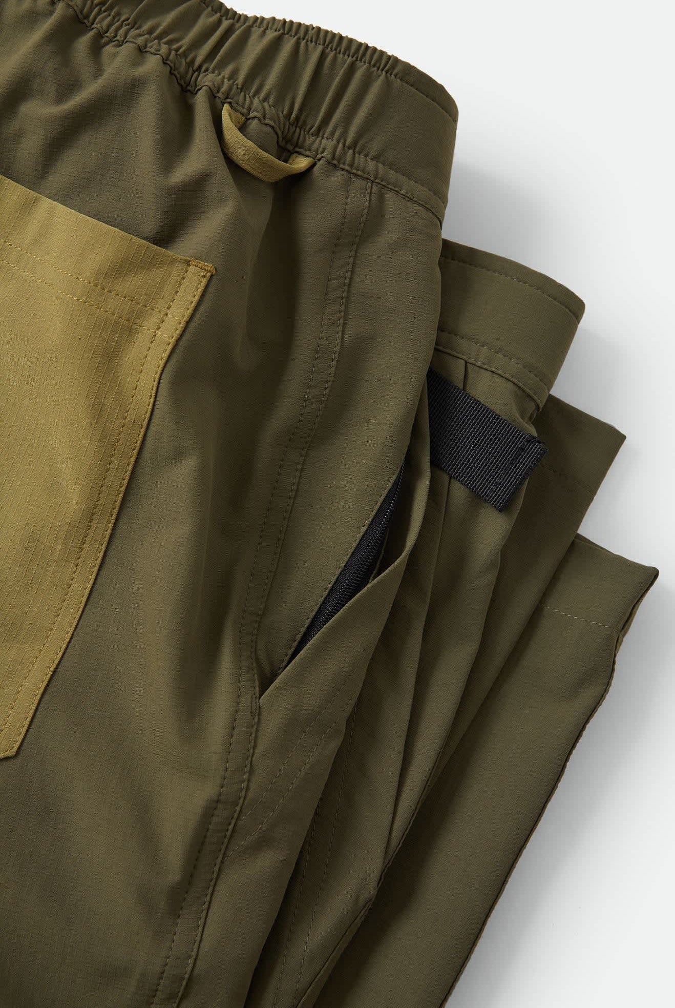 Men's Journey Utility Pant in the color Dark Olive/Olive Surplus - Additional Laydown image