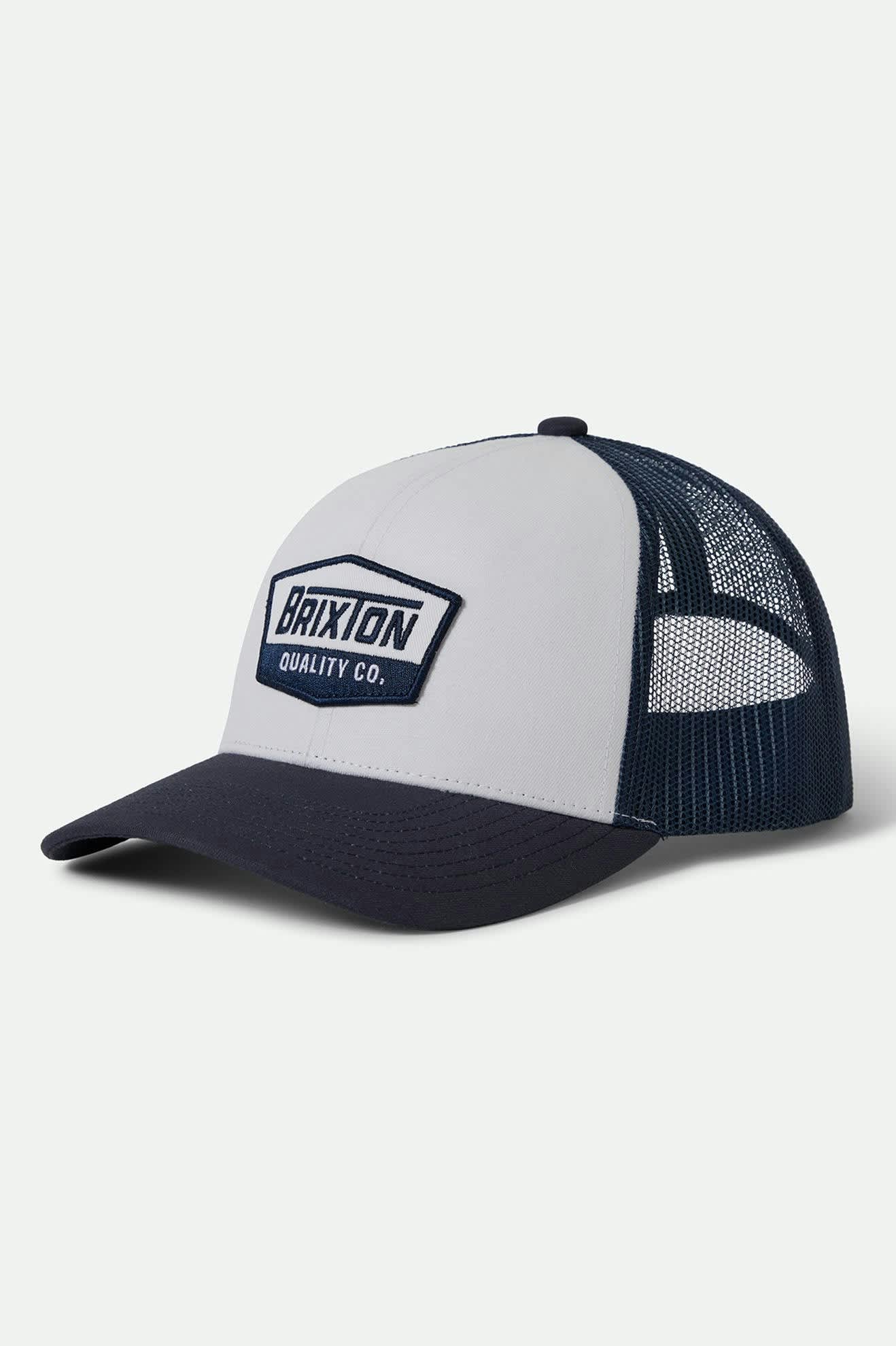 Unisex Regal Netplus Trucker Hat in the color Washed Navy/White/Washed Navy - Front Product View