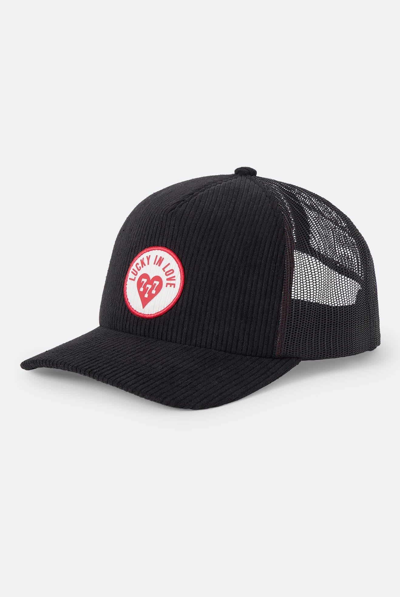 Unisex Lucky In Love Trucker Hat in the color Black - Front Product Laydown Image