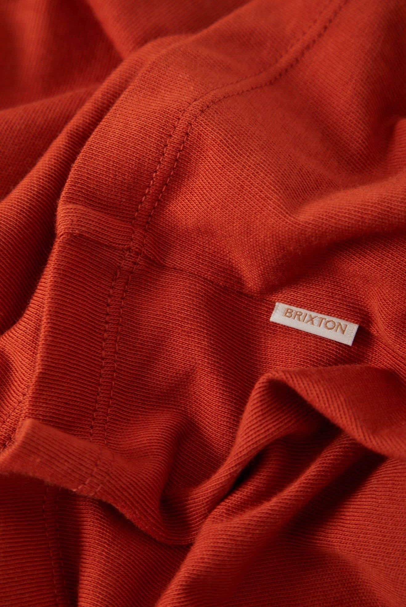 Women's Carefree Organic Garment Dye Ringer T-Shirt in the color Rust/Off White - Additional Laydown image