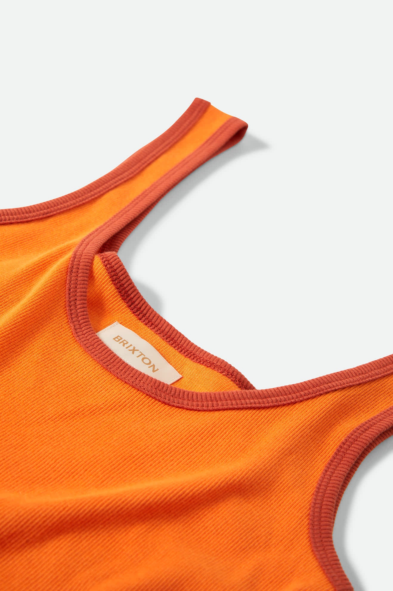 Women's Ringer Organic A-Tank in the color Tangerine/Burnt Brick - Additional Laydown image