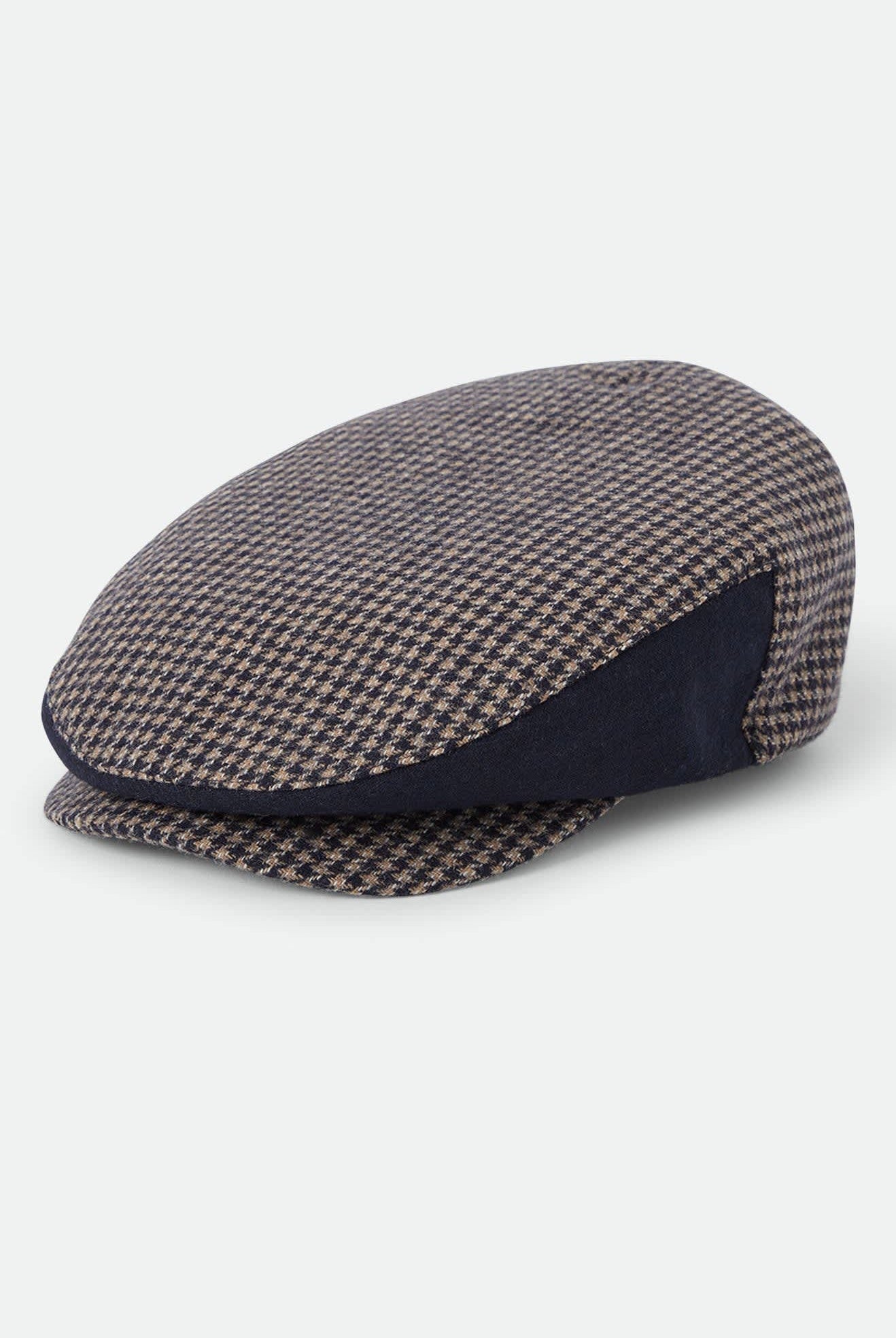 Unisex Hooligan Flat Cap in the color Navy/Sand Houndstooth - Front Product Laydown Image