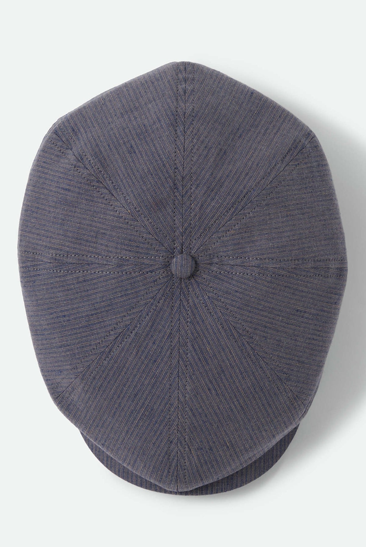Unisex Brood Newsboy Cap in the color Indigo/Dark Sand - Additional Laydown image