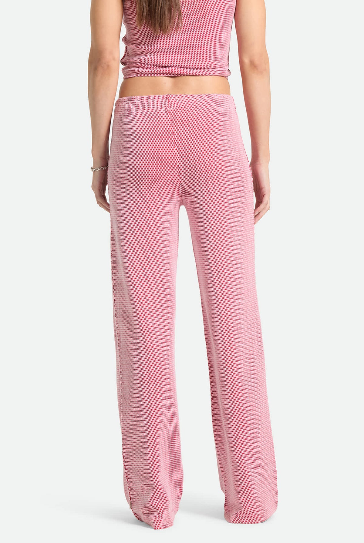 Women's Siesta Knit Pant in the color Adrenaline Rush/White Weave - Women's Back View