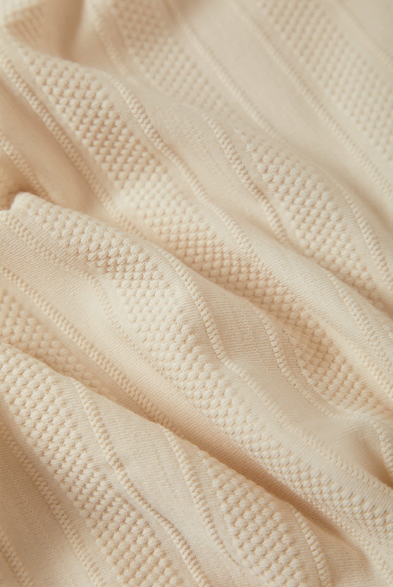 Men's Theo Jacquard Short Sleeve Polo in the color Cream - Additional Laydown image