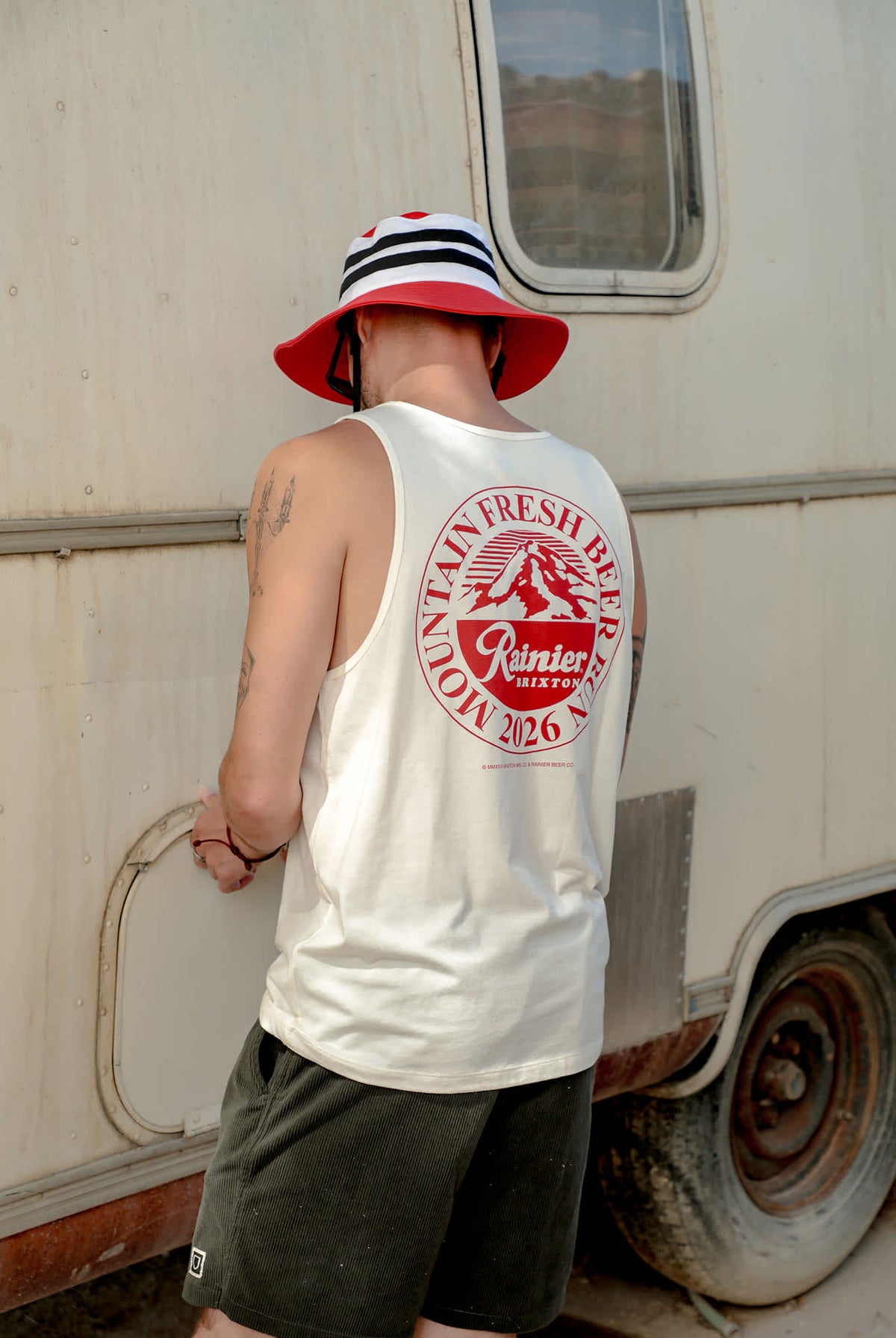 Men's Rainier Beer Run Tank in the color Natural - Men's Lifestyle 2.0