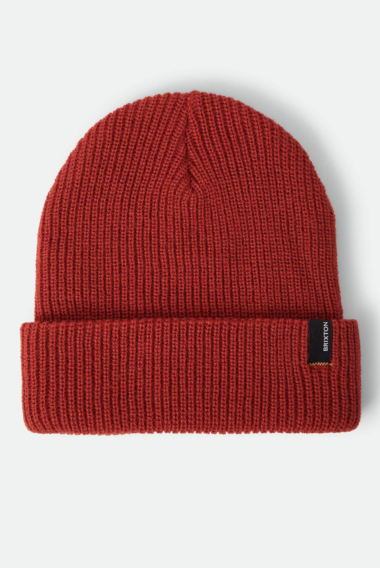 Unisex Heist Beanie in the color Red Earth - Front Product Laydown Image