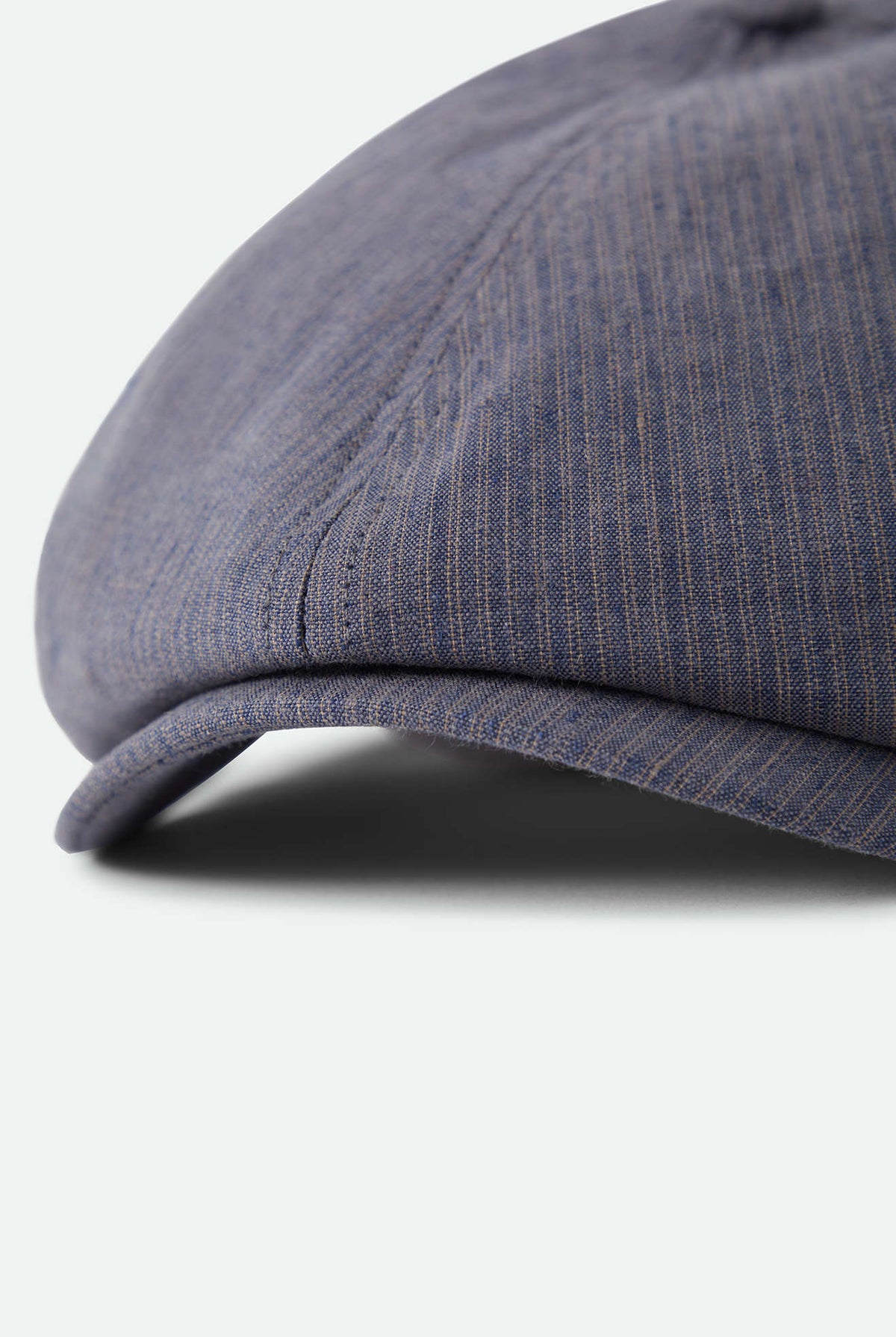 Unisex Brood Newsboy Cap in the color Indigo/Dark Sand - Additional Laydown image