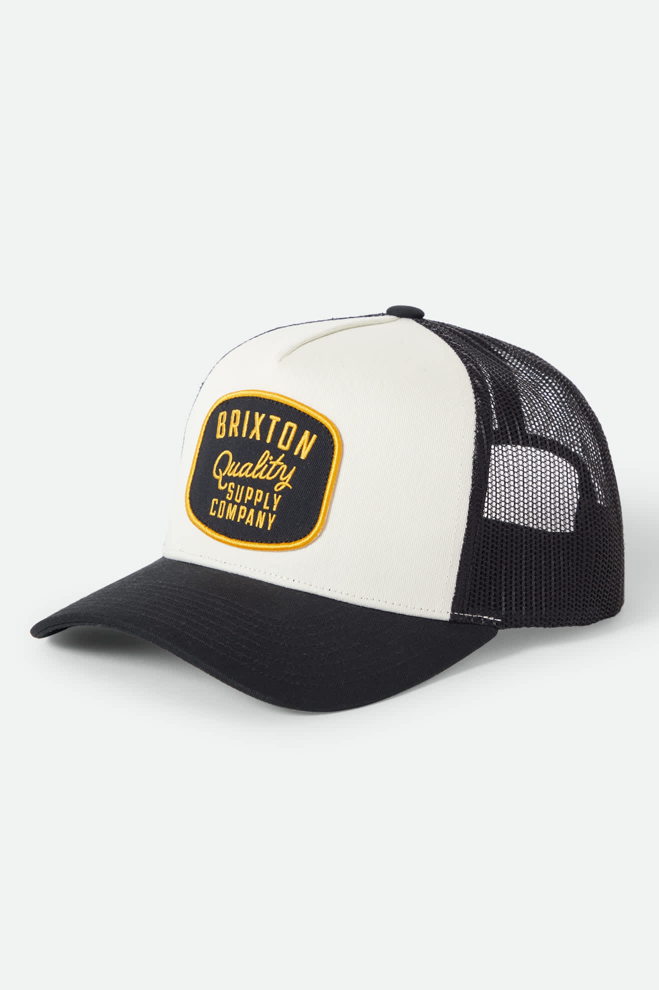 Unisex Hubal Netplus Trucker Hat in the color Black/Off White/Black - Front Product Laydown Image