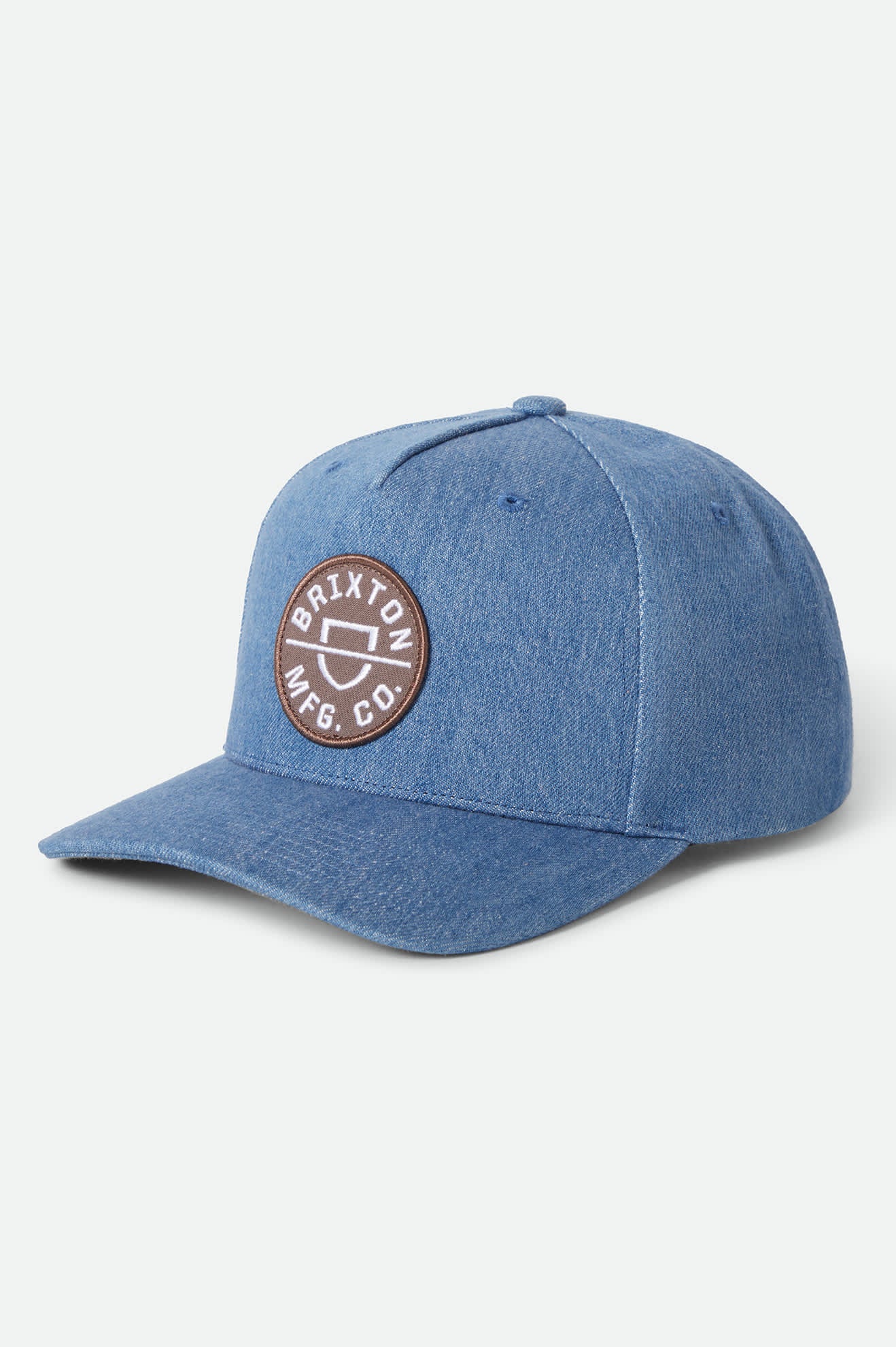 Unisex Crest Netplus Snapback in the color Medium Rinse Denim - Front Product Laydown Image
