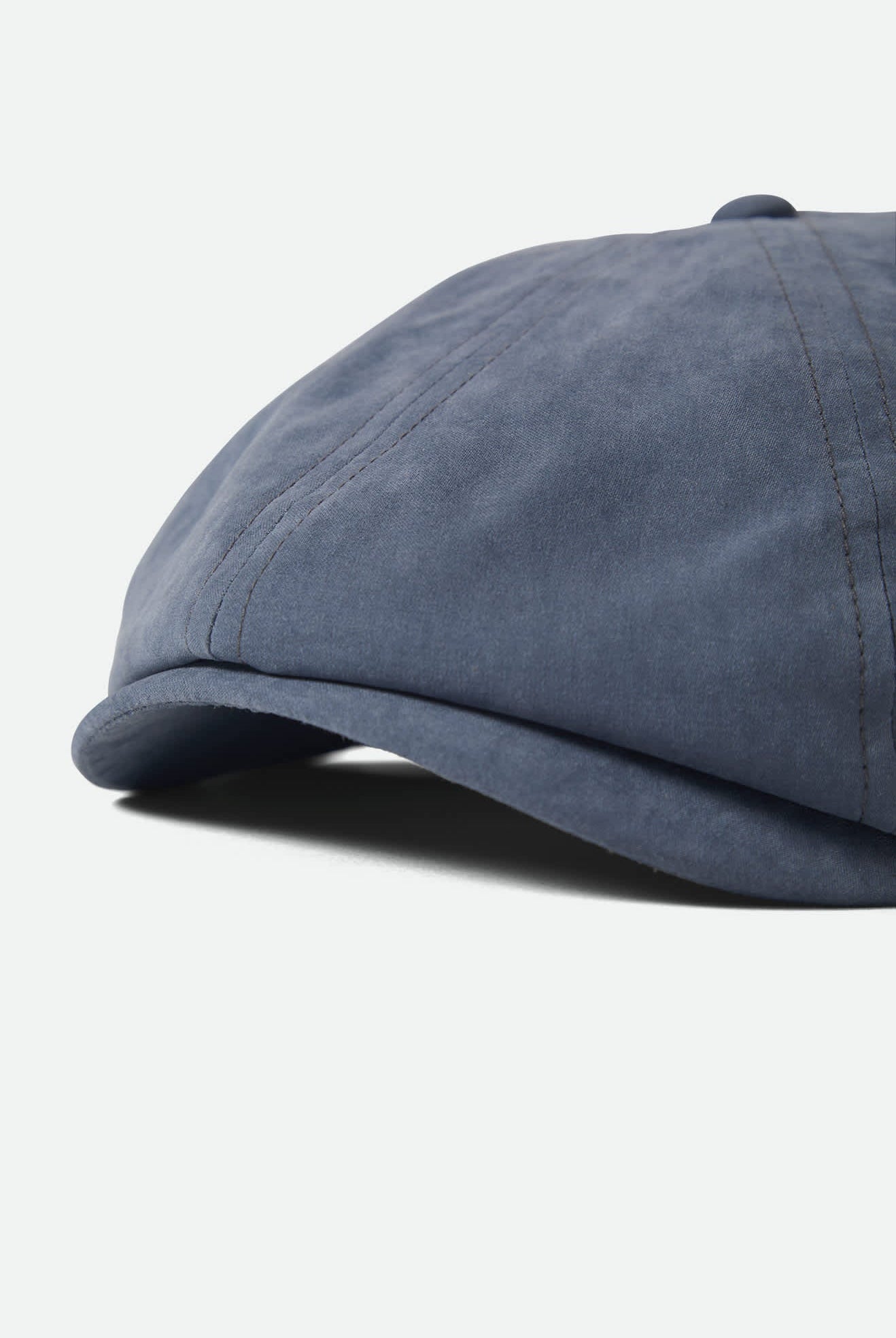 Unisex Brood Newsboy Cap in the color Slate Blue Brushed Satin - Additional Laydown image