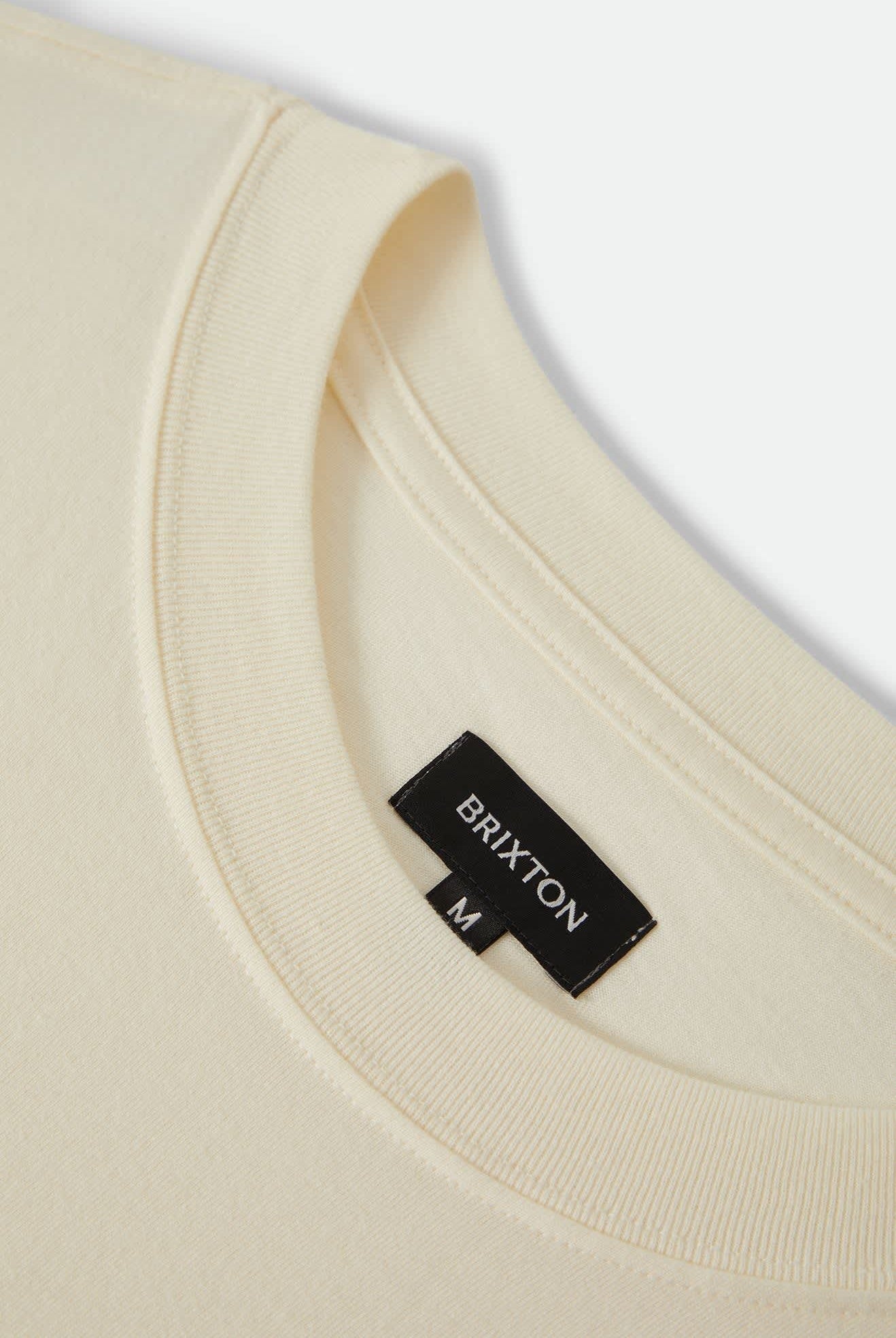 Men's Serrano Short Sleeve Boxed Crop T-Shirt in the color Cream - Additional Laydown image