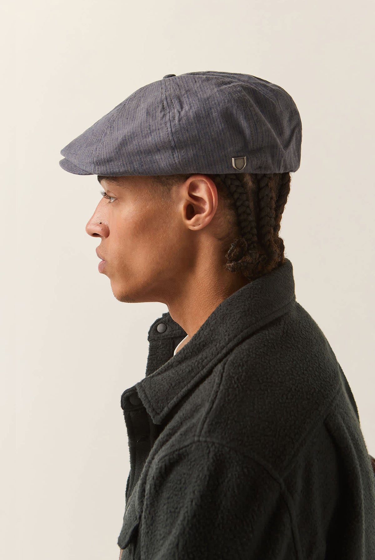 Unisex Brood Newsboy Cap in the color Indigo/Dark Sand - Men's Back View