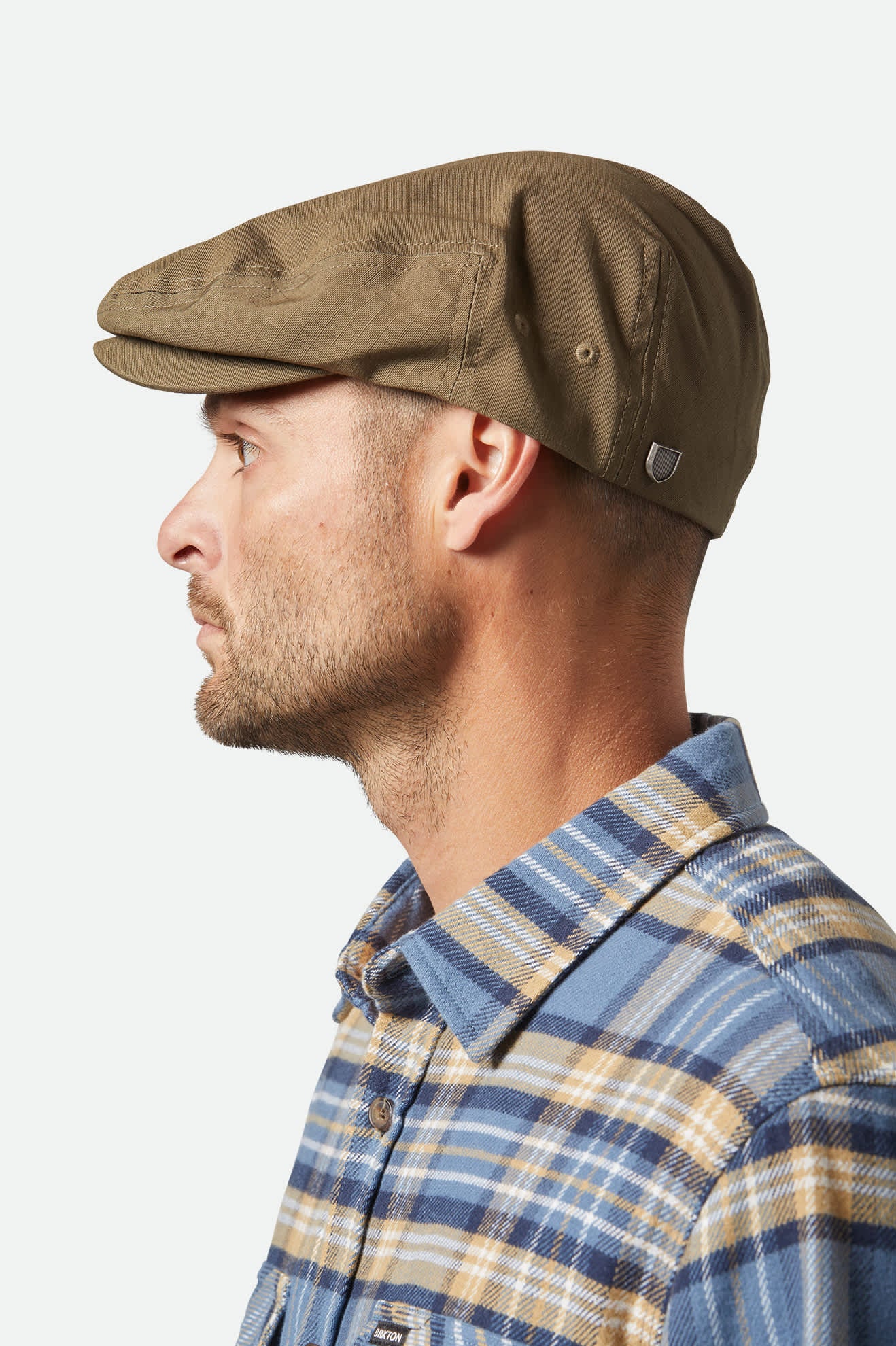 Unisex Hooligan Lightweight Flat Cap in the color Ivy Green Ripstop - Men's Side View
