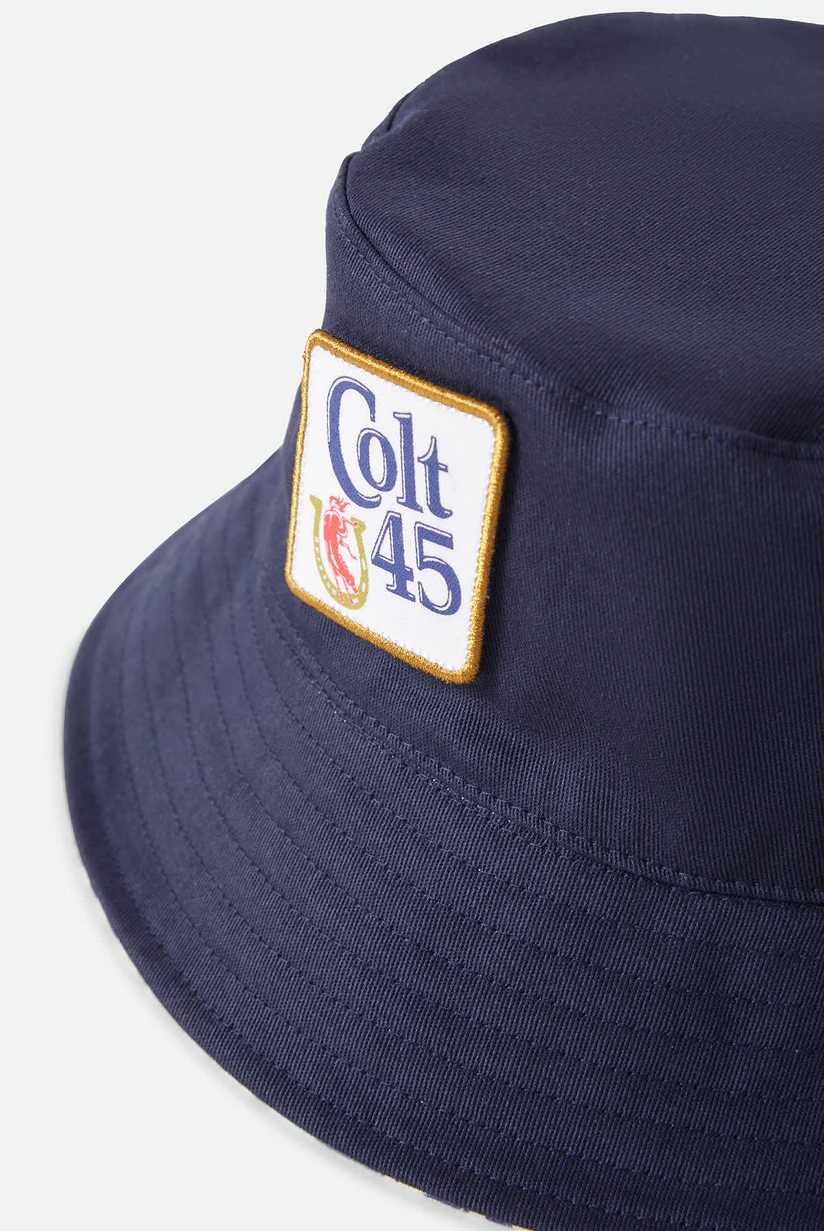 Unisex Colt 45 X Brixton Bucket Hat in the color Multi/Midnight Blue - Additional Laydown image
