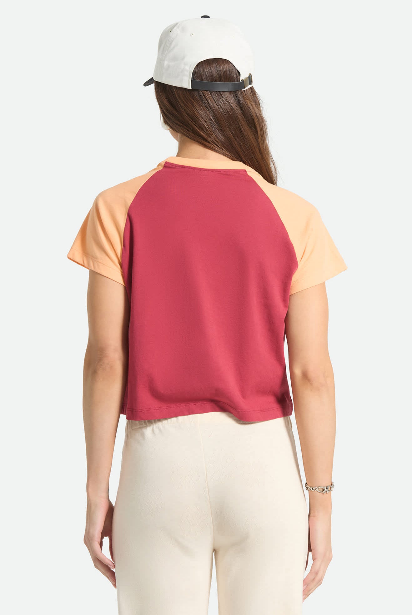 Women's Swallow Sky Cropped Raglan in the color Robust Red/Peach Cobbler - Women's Back View