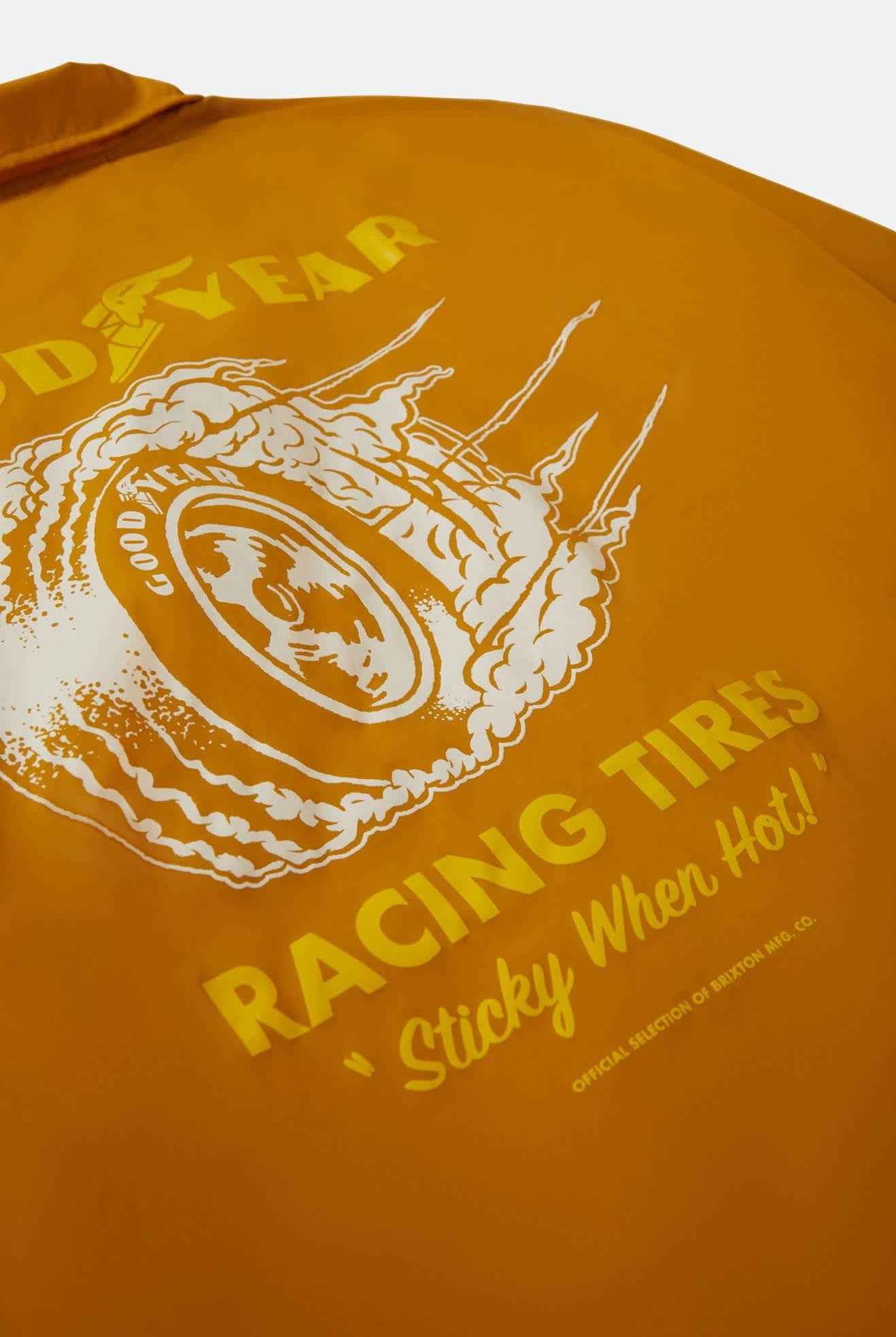 Men's Goodyear Slick Wind Breaker in the color Nugget Gold - Additional Laydown image