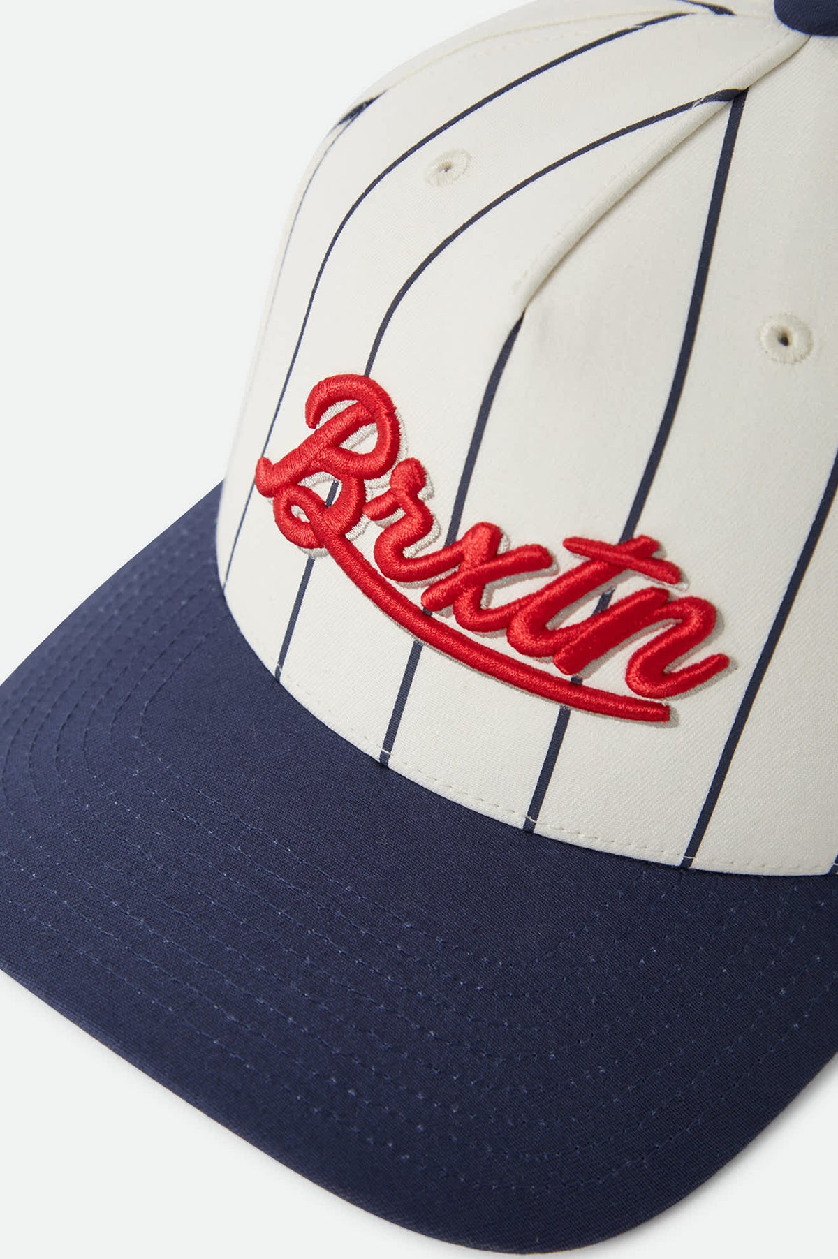 Unisex Jenson Snapback in the color Off White Pinstripe/Classic Navy - Additional Laydown image