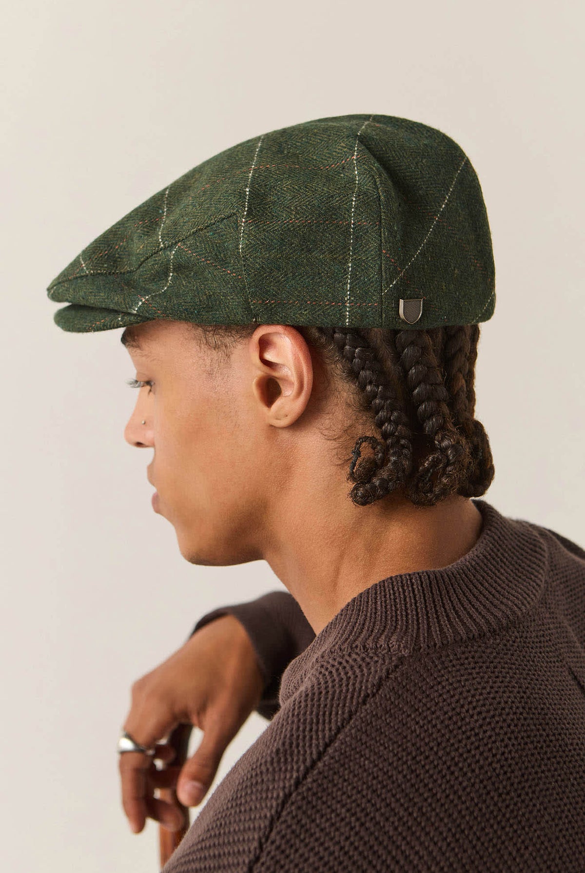 Unisex Hooligan Flat Cap in the color Moss/Orange - Men's Back View