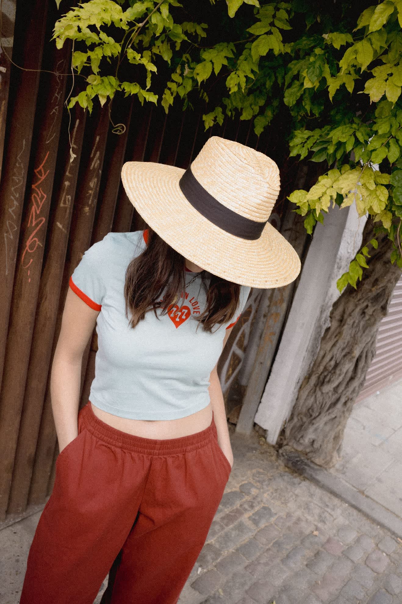 Women's Lucky In Love Baby T-Shirt in the color Sea Grass/Adrenaline Red - Women's Lifestyle 3.0