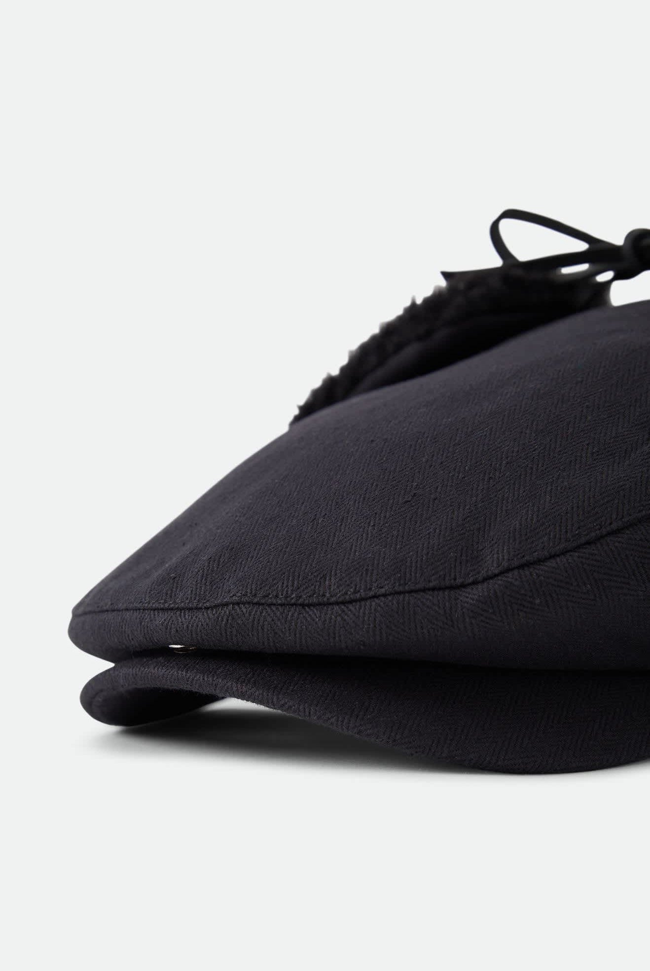 Unisex Barrel Earflap Snap Cap in the color Black/Black - Additional Laydown image