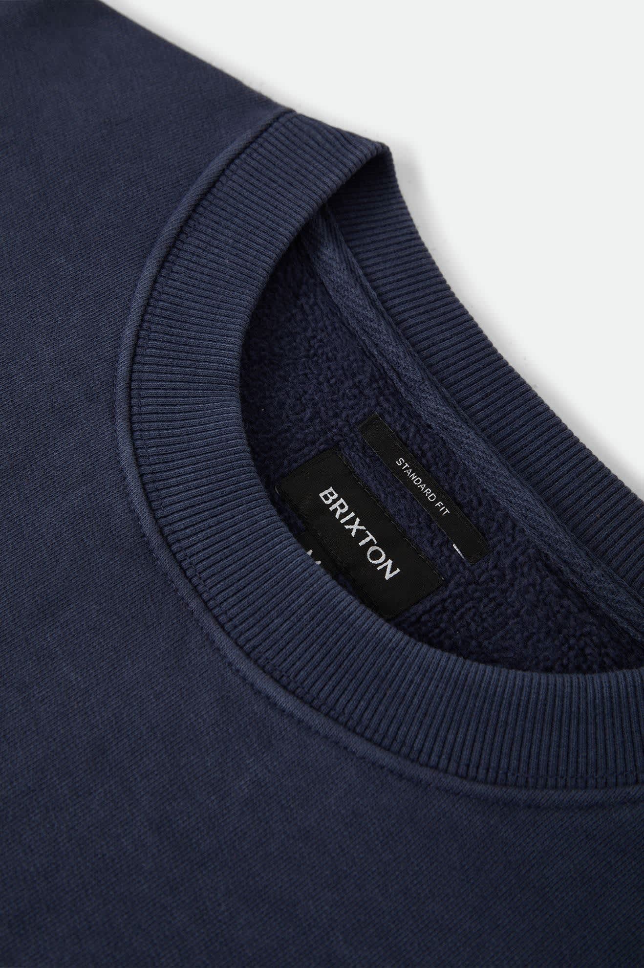 Men's Brixton Baseline Crew Fleece in the color Washed Navy Vintage Wash - Additional Laydown image