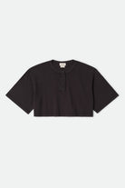 Women's Carefree Organic Garment Dye Cropped Henley in the color Black - Front Product Laydown Image