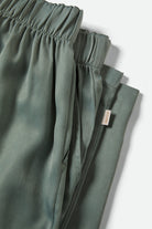 Women's Soho Silky Pant in the color Blue Green Shine - Additional Laydown image