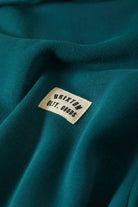 Men's Woodburn Hoodie in the color Night Sage - Additional Laydown image