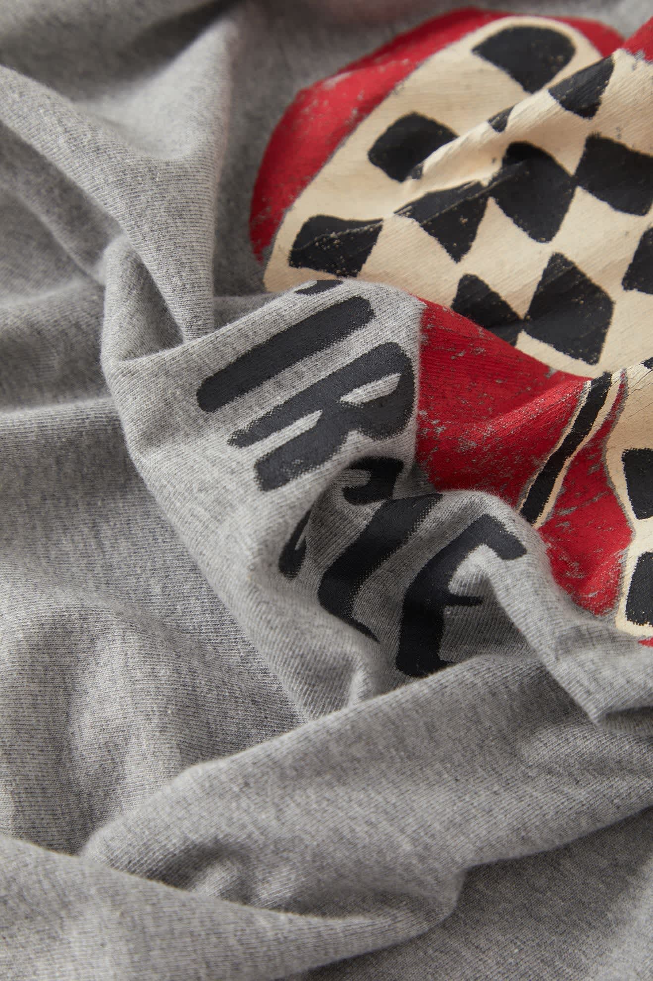 Women's Winners Circle Boxy Football T-Shirt in the color Heather Grey/Black - Additional Laydown image