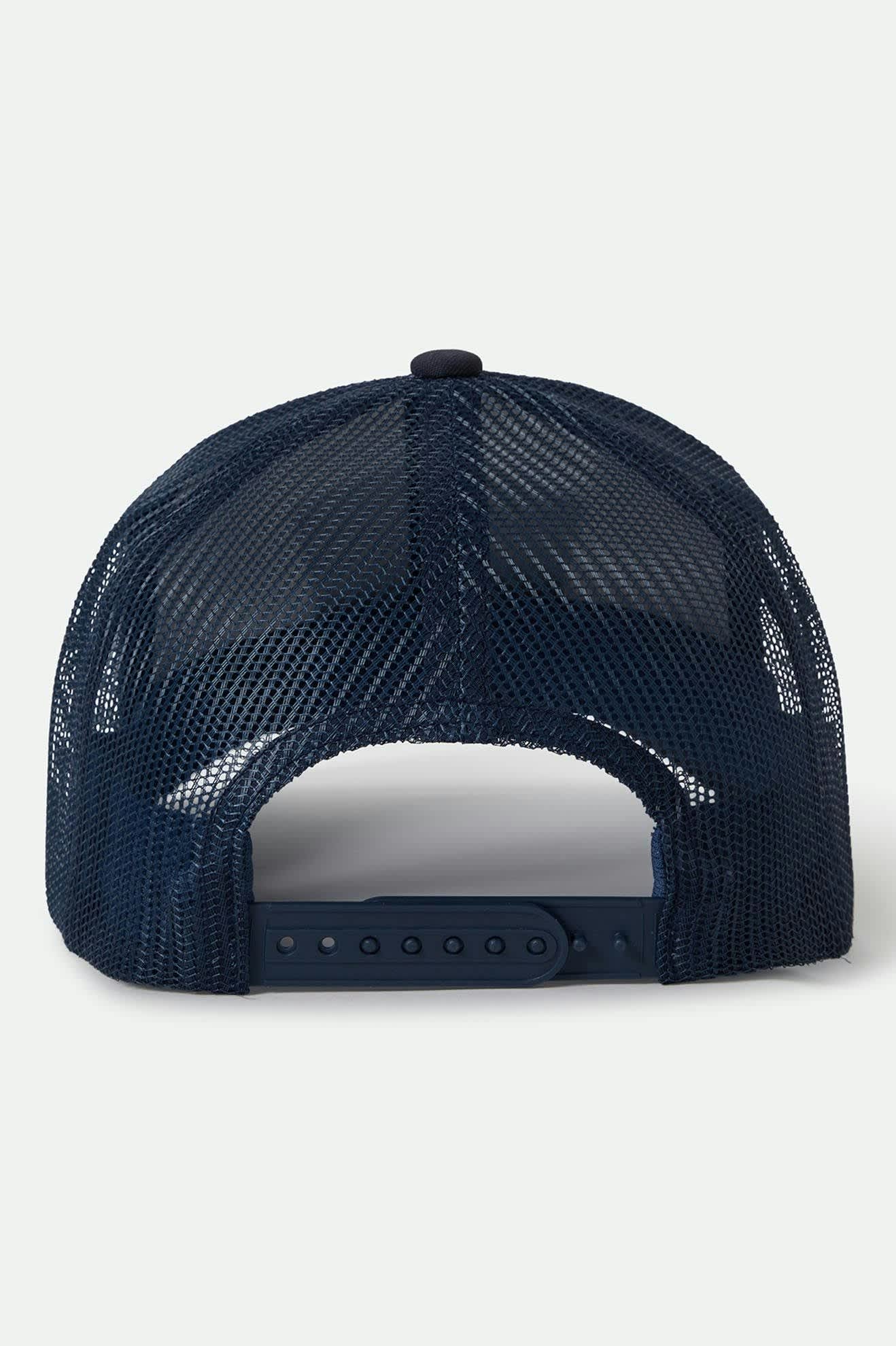 Unisex Regal Netplus Trucker Hat in the color Washed Navy/White/Washed Navy - Back Style View