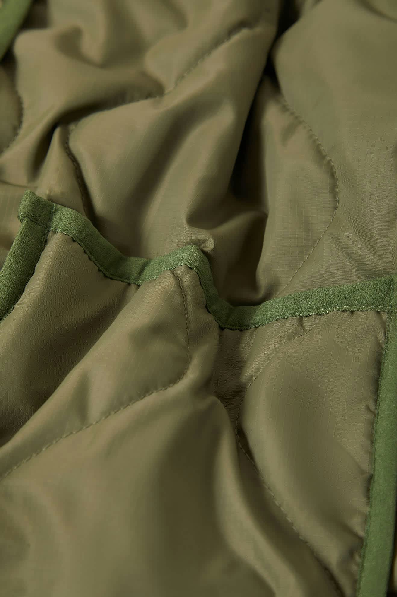 Women's Delilah Quilted Jacket in the color Olive Surplus - Additional Laydown image