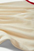 Women's Ringer Organic A-Tank in the color Off White/Crimson - Additional Laydown image