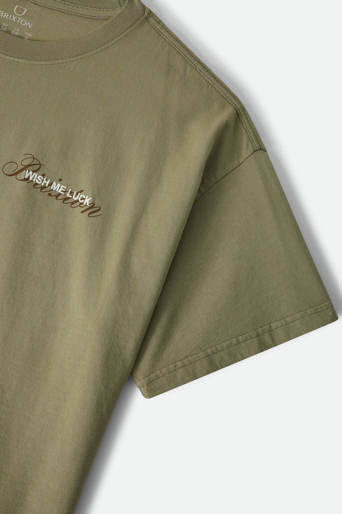 Women's Wish Me Luck Boxy Crop T-Shirt in the color Olive Surplus - Additional Laydown image