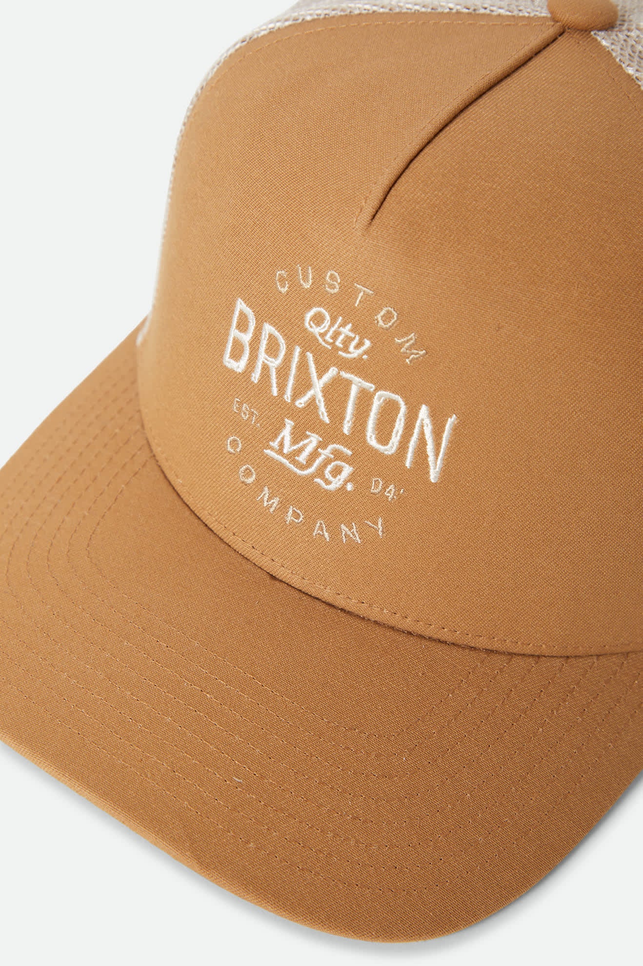Unisex Fremont Netplus Trucker Hat in the color Copper/Sand - Additional Laydown image