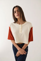 Women's Carefree Organic Garment Dye Cropped Henley in the color Off White/Rust - Additional Fit image