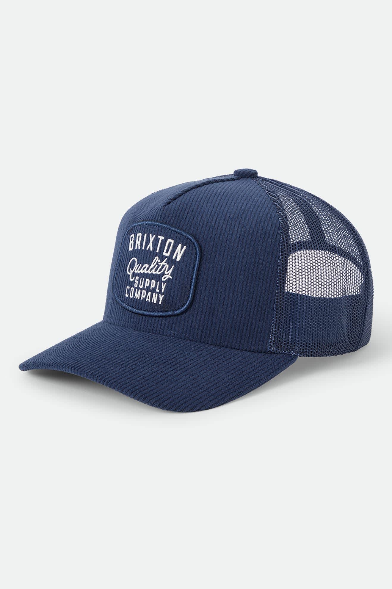 Unisex Hubal Trucker Hat in the color Dark Navy Corduroy - Front Product Laydown Image