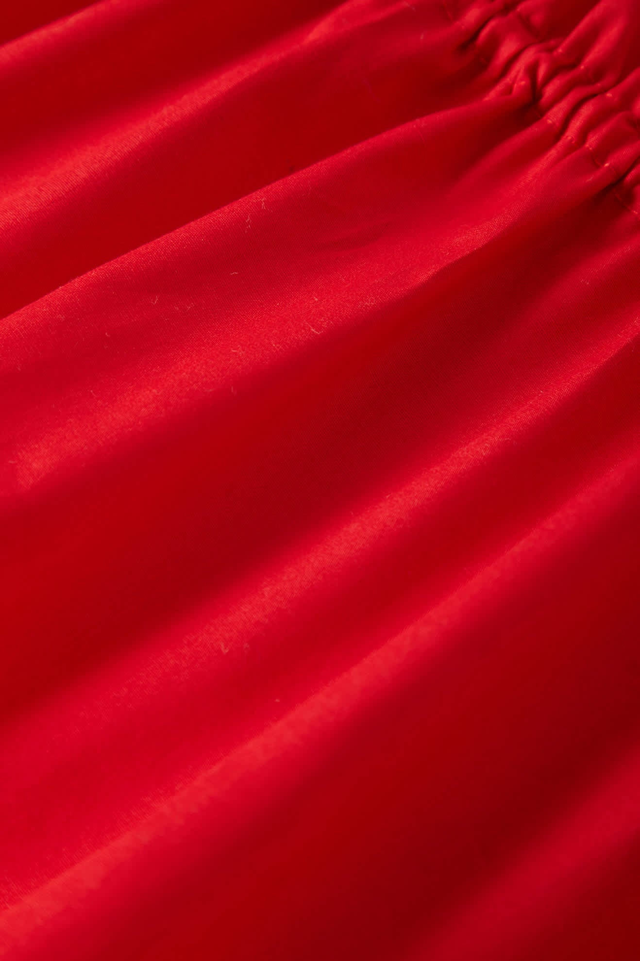 Women's The Bells Top in the color Adrenaline Rush - Additional Laydown image
