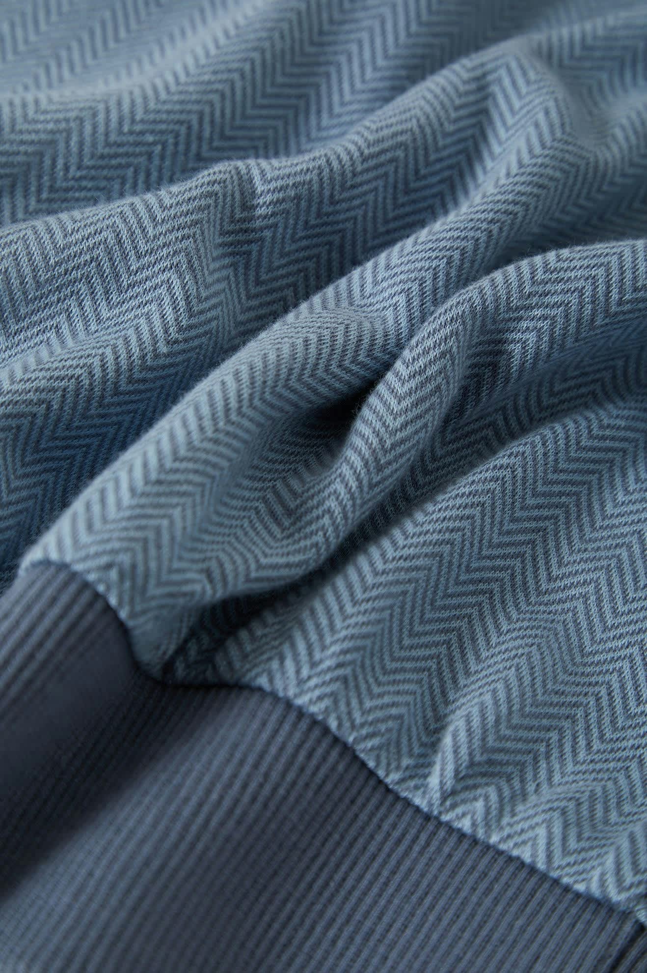 Men's Weekend Herringbone S/S Polo in the color Borrow Blue/Berring Sea - Additional Laydown image