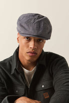 Unisex Brood Newsboy Cap in the color Indigo/Dark Sand - Men's Front View