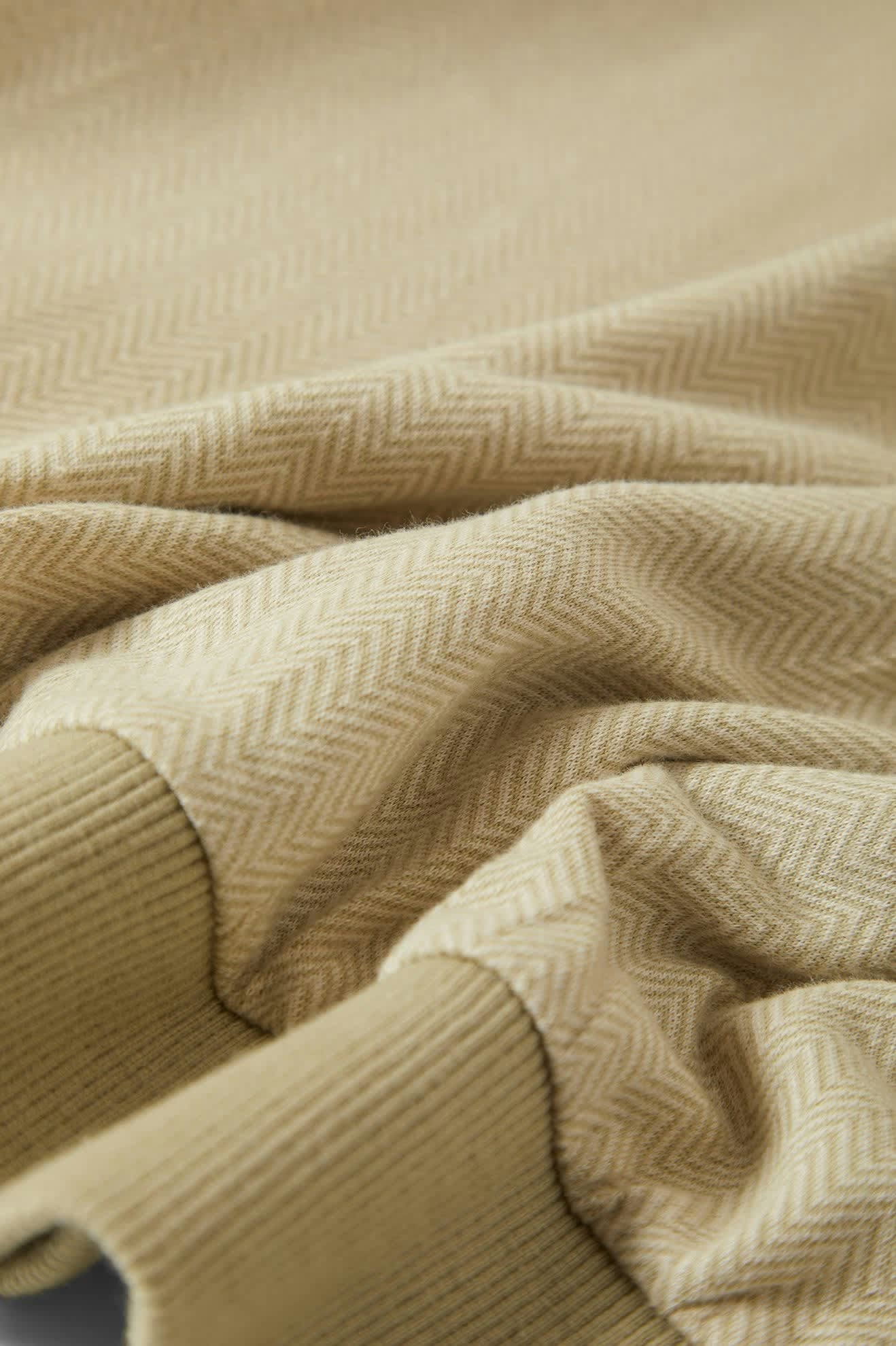 Men's Weekend Herringbone S/S Polo in the color Whitecap/Elm - Additional Laydown image