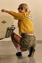 Women's Goodyear Mechanics Women's Garage Jacket in the color Nugget Gold - Women's Back View