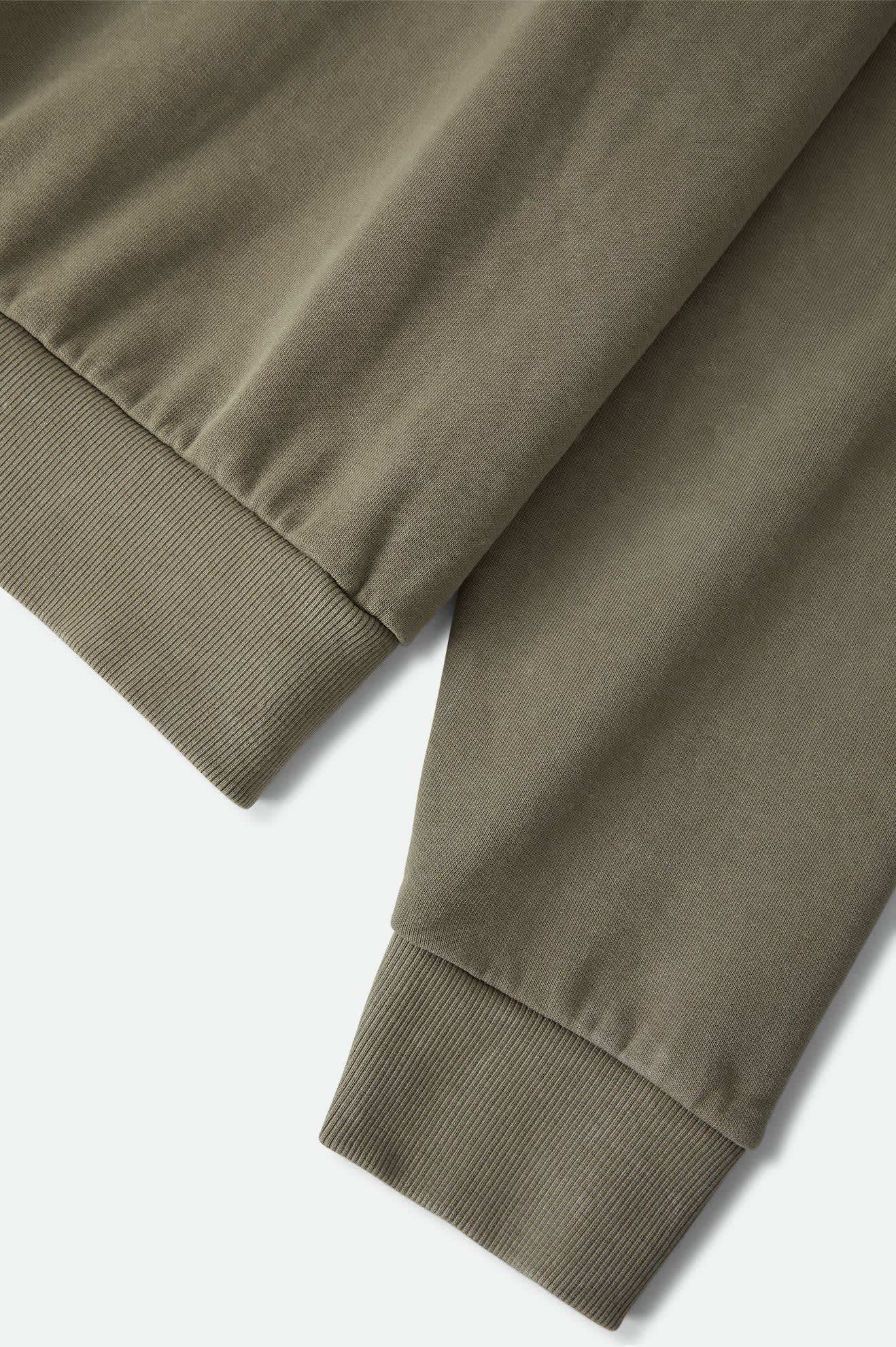Men's Brixton Baseline Crew Fleece in the color Olive Surplus Vintage Wash - Additional Laydown image