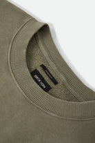 Men's Brixton Baseline Crew Fleece in the color Olive Surplus Vintage Wash - Additional Laydown image