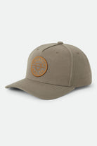 Unisex Crest Snapback in the color Dark Olive/Caramel - Front Product Laydown Image