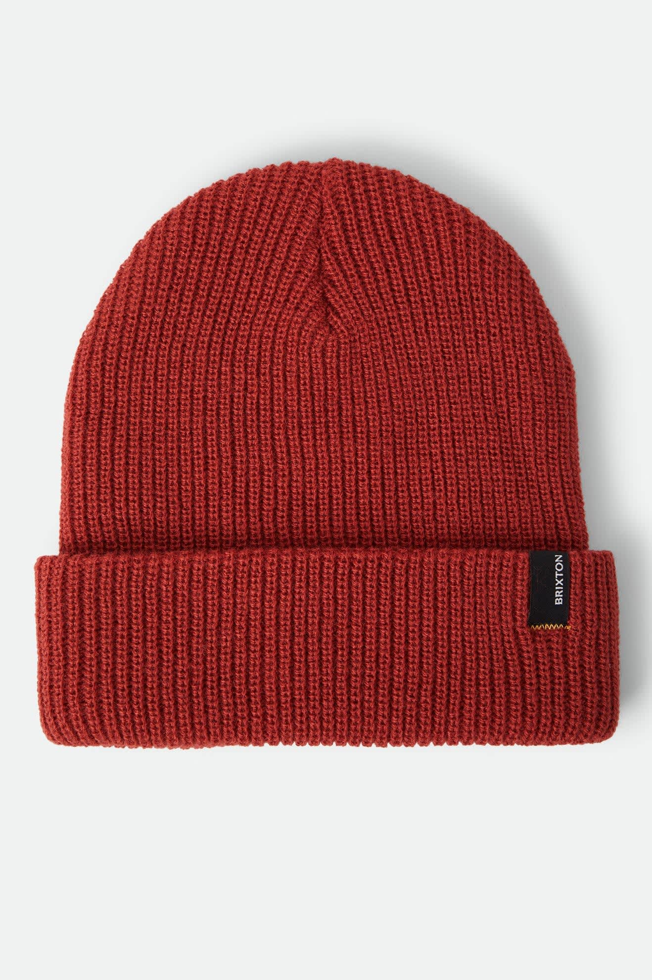 Unisex Heist Beanie in the color Red Earth - Front Product Laydown Image