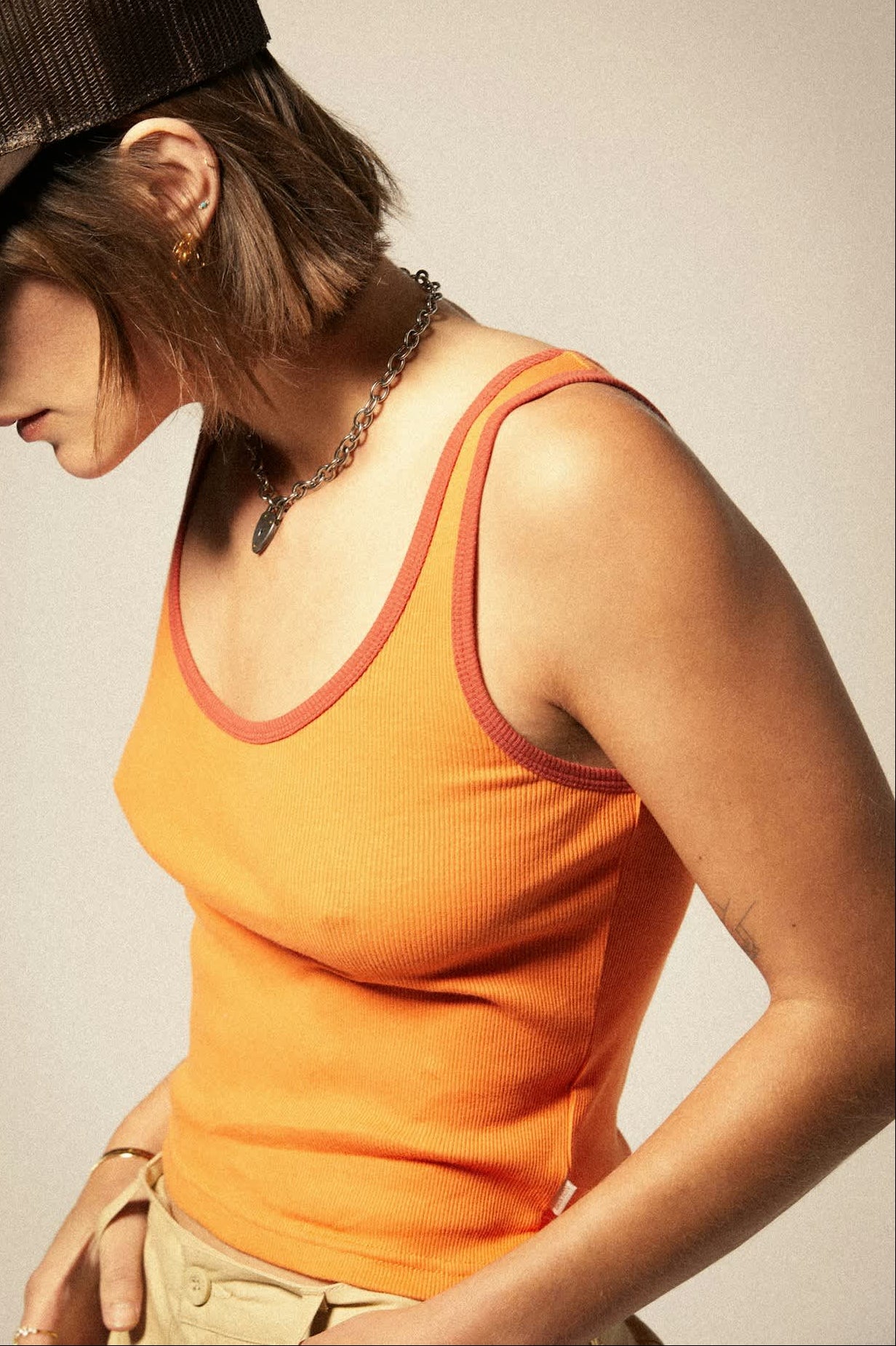 Women's Ringer Organic A-Tank in the color Tangerine/Burnt Brick - Women's Side View